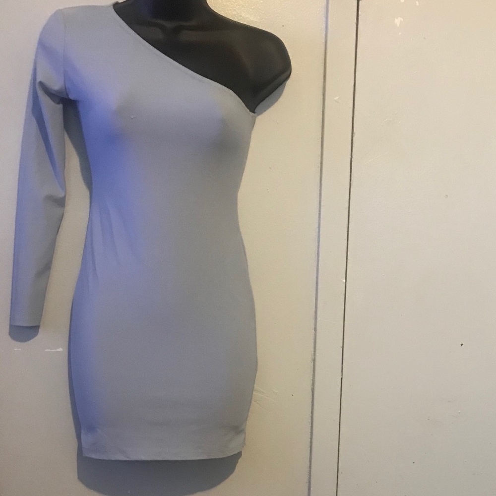 One shoulder dress, hugs curves